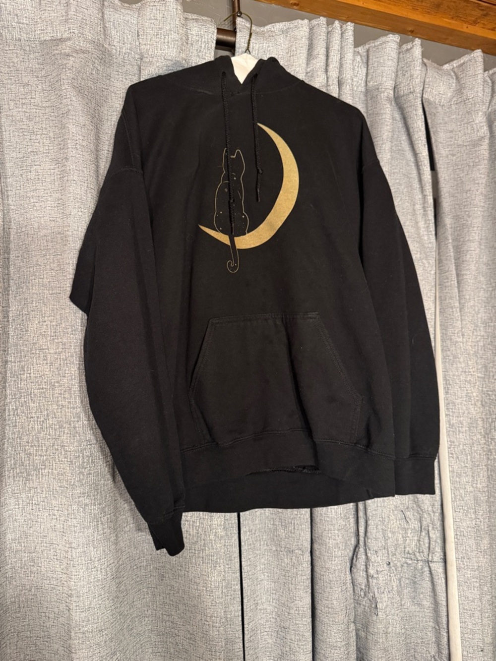 3/$15! 🎈 Black Hoodie with Gold Crescent Moon & Cat Graphic